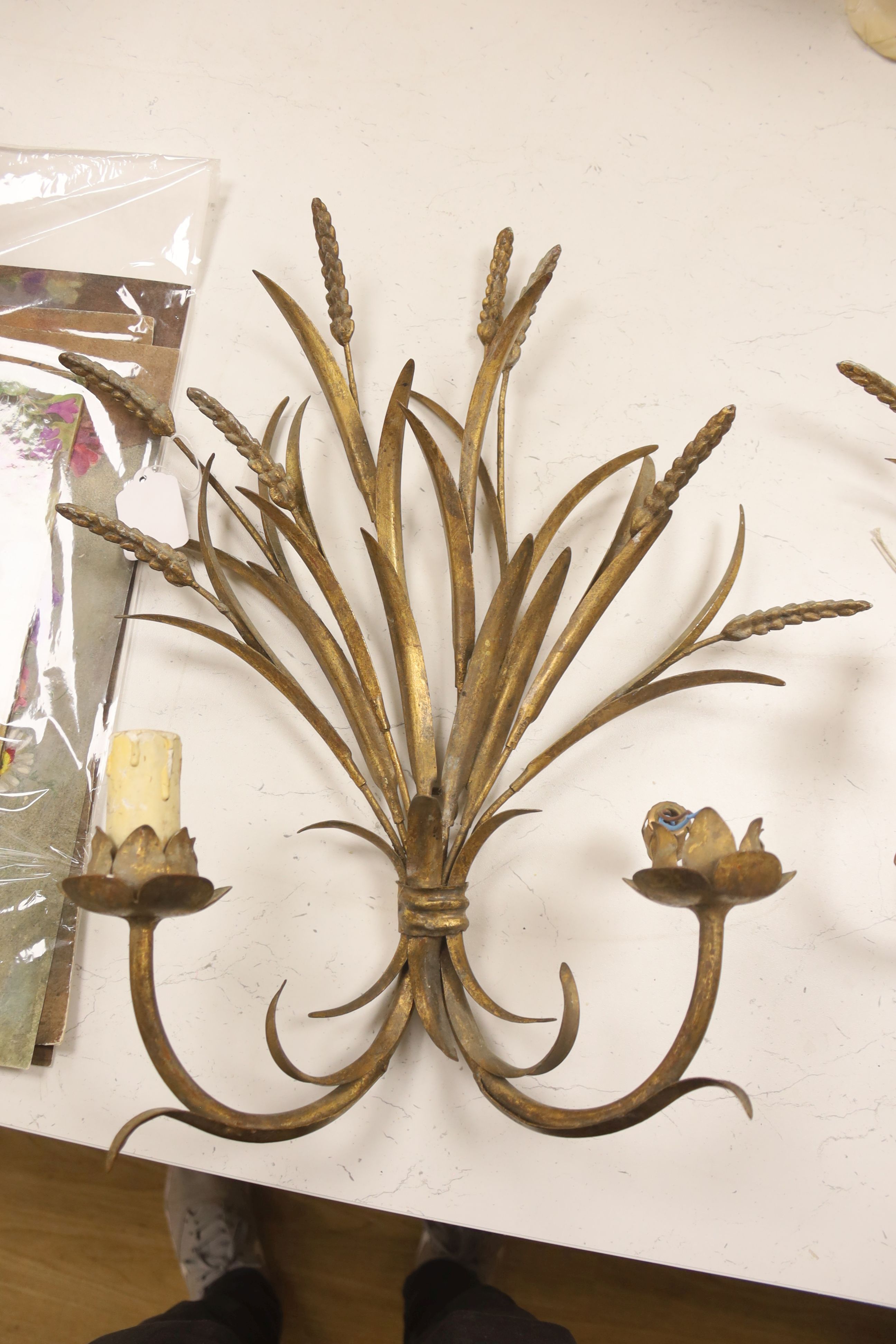 Three gilt metal wheatsheaf two branch wall lights, height 50cm